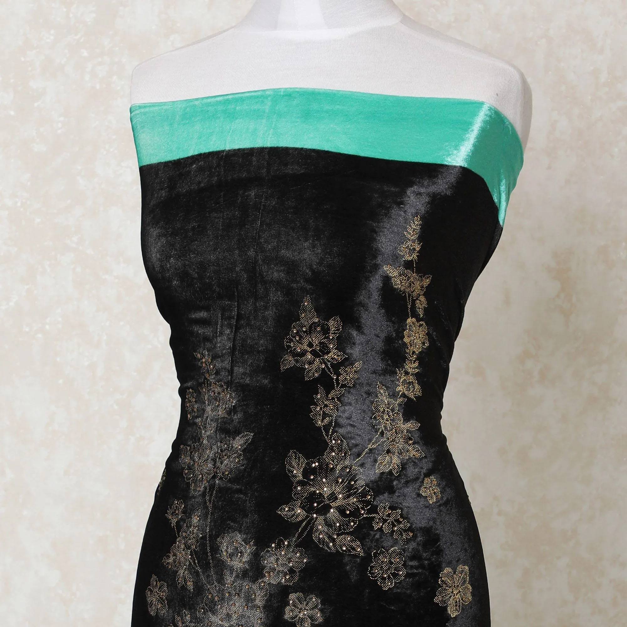 Black to pastel green silk blended velvet fabric with gold foil print having stone work in floral design-D12006