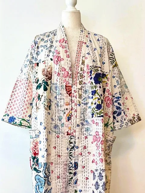 Bright Garden Quilt Robe Is Colorful Against a White Background