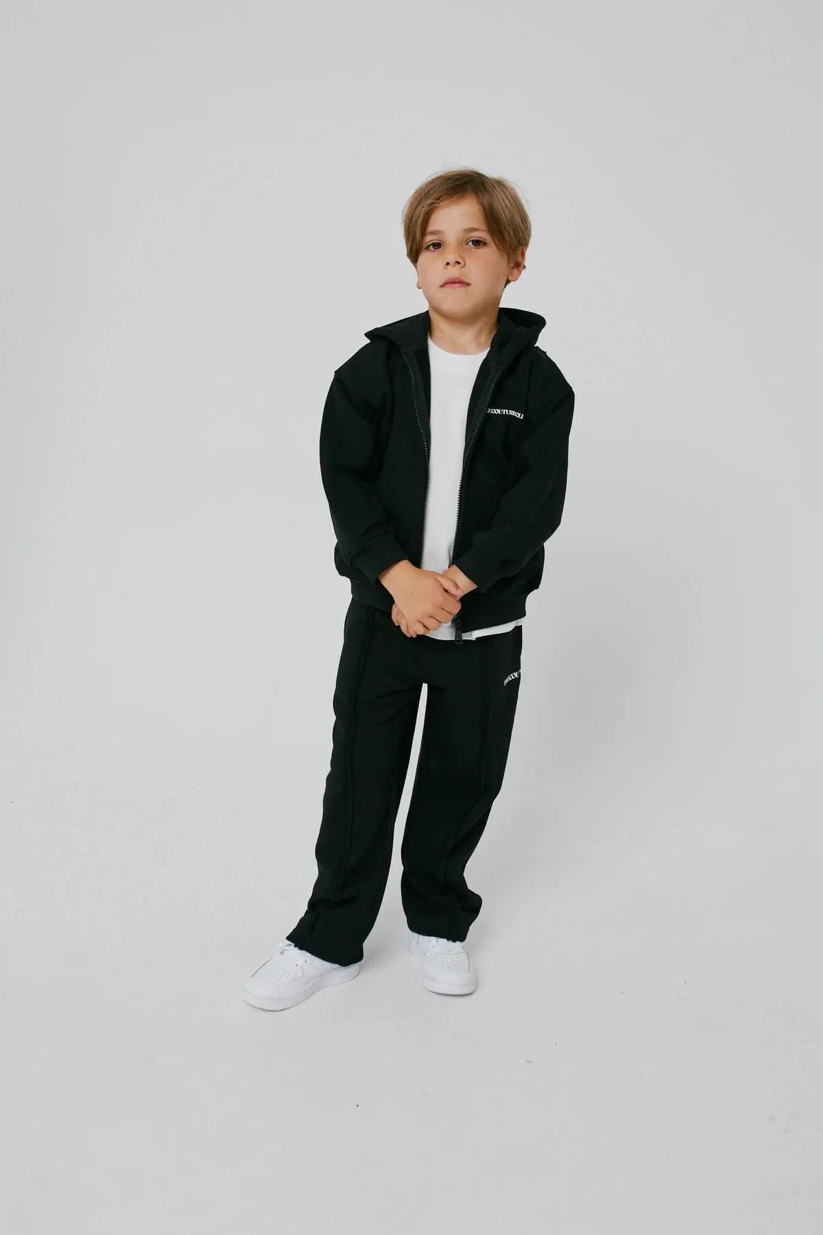 The Couture Club Kids Raw Seam Members Only Joggers in Black